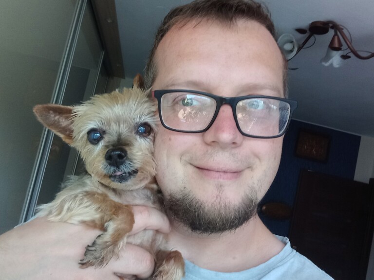 Funny Yorkshire Terrier with owner